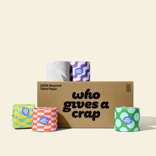 A medium box of Who Gives A Crap Recycled Toilet Paper with colorful wrappers - eco-friendly, biodegradable and sustainable toilet paper 